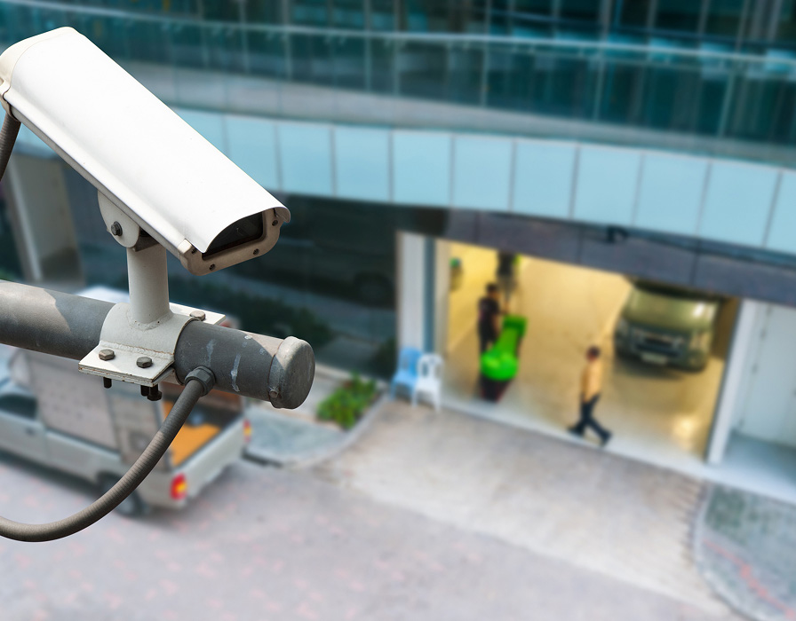 High-traffic pedestrian area under CCTV surveillance.